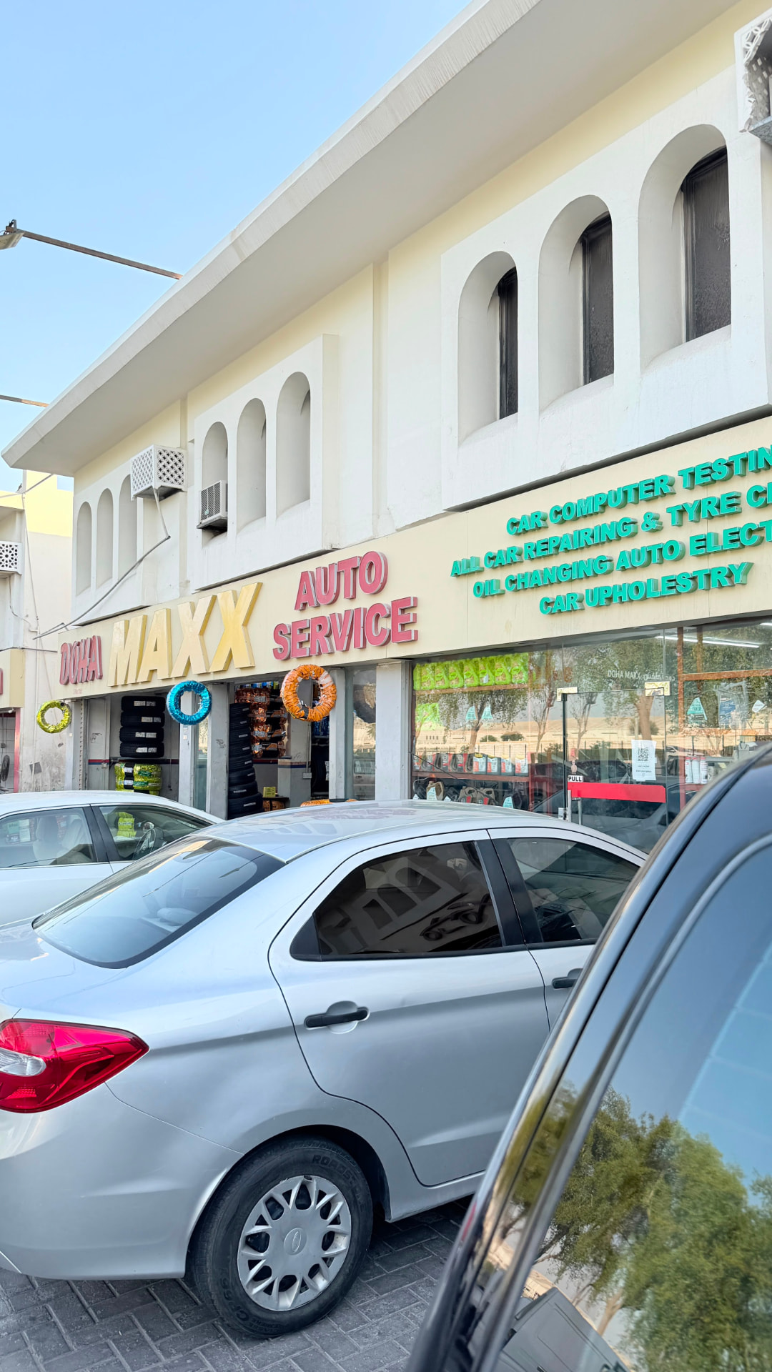 Doha Maxx Auto Service storefront on Old Airport Road